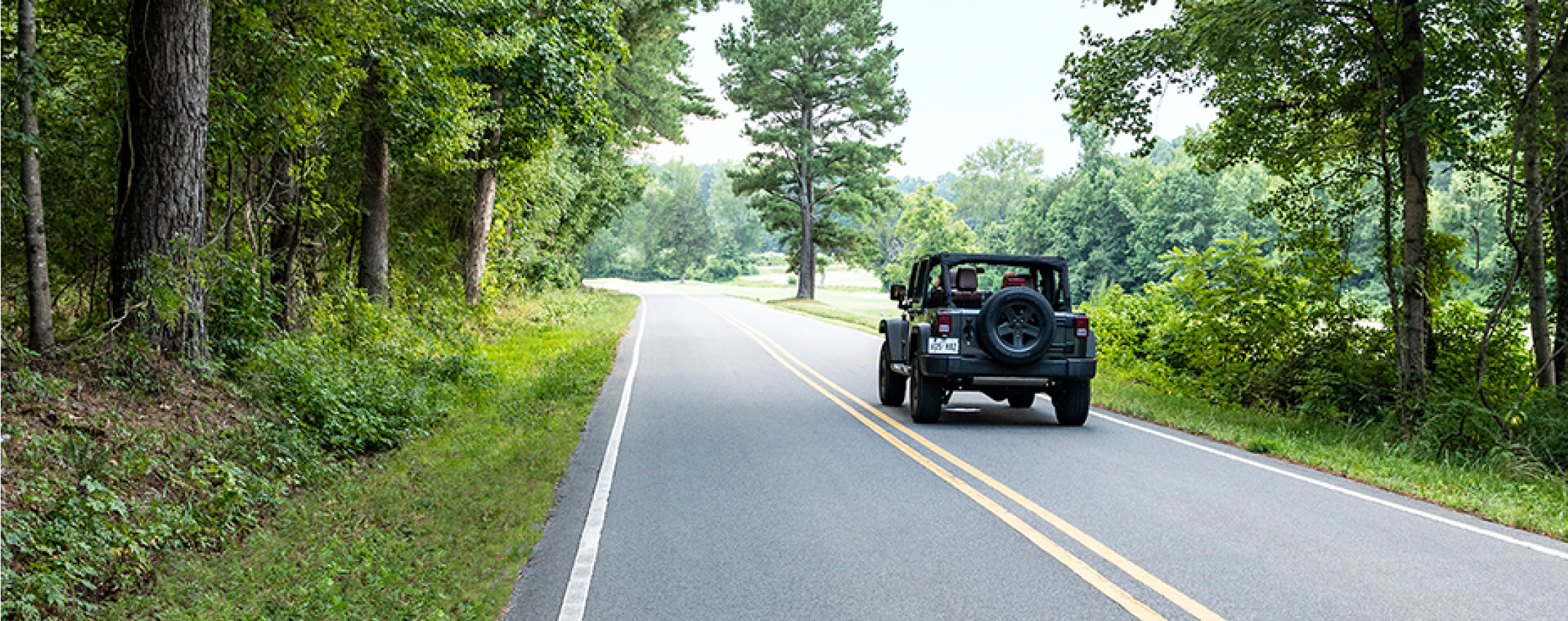 Car driving down the road